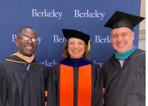 'MBA 99, Patrick Awuha, Dean Ann Harrison and Pete Johnson at the 2019 MBA Commencement Ceremony