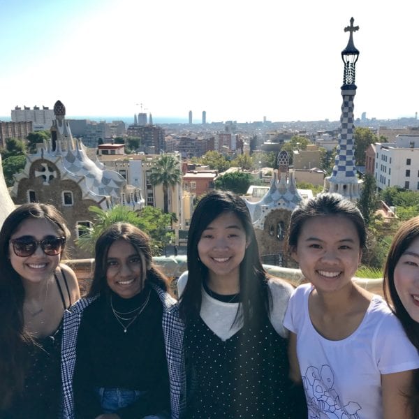 Group of GMP students with cityscape in the background