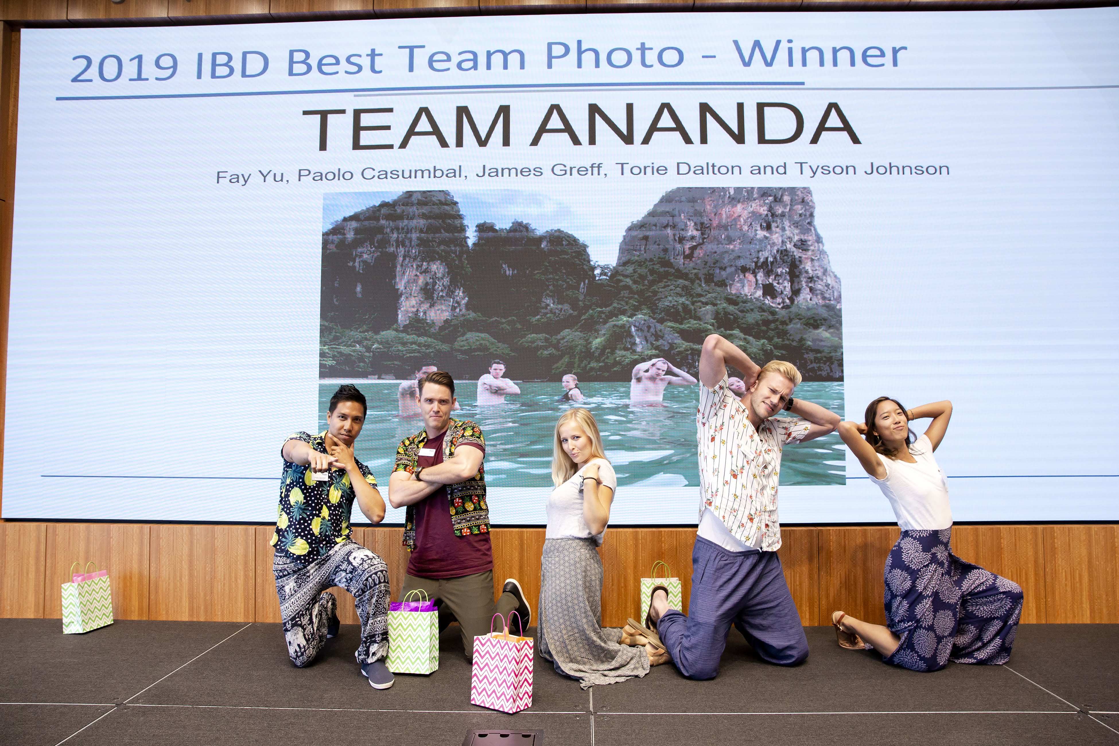 Team Ananda posing on stage after winning best team photo 2019