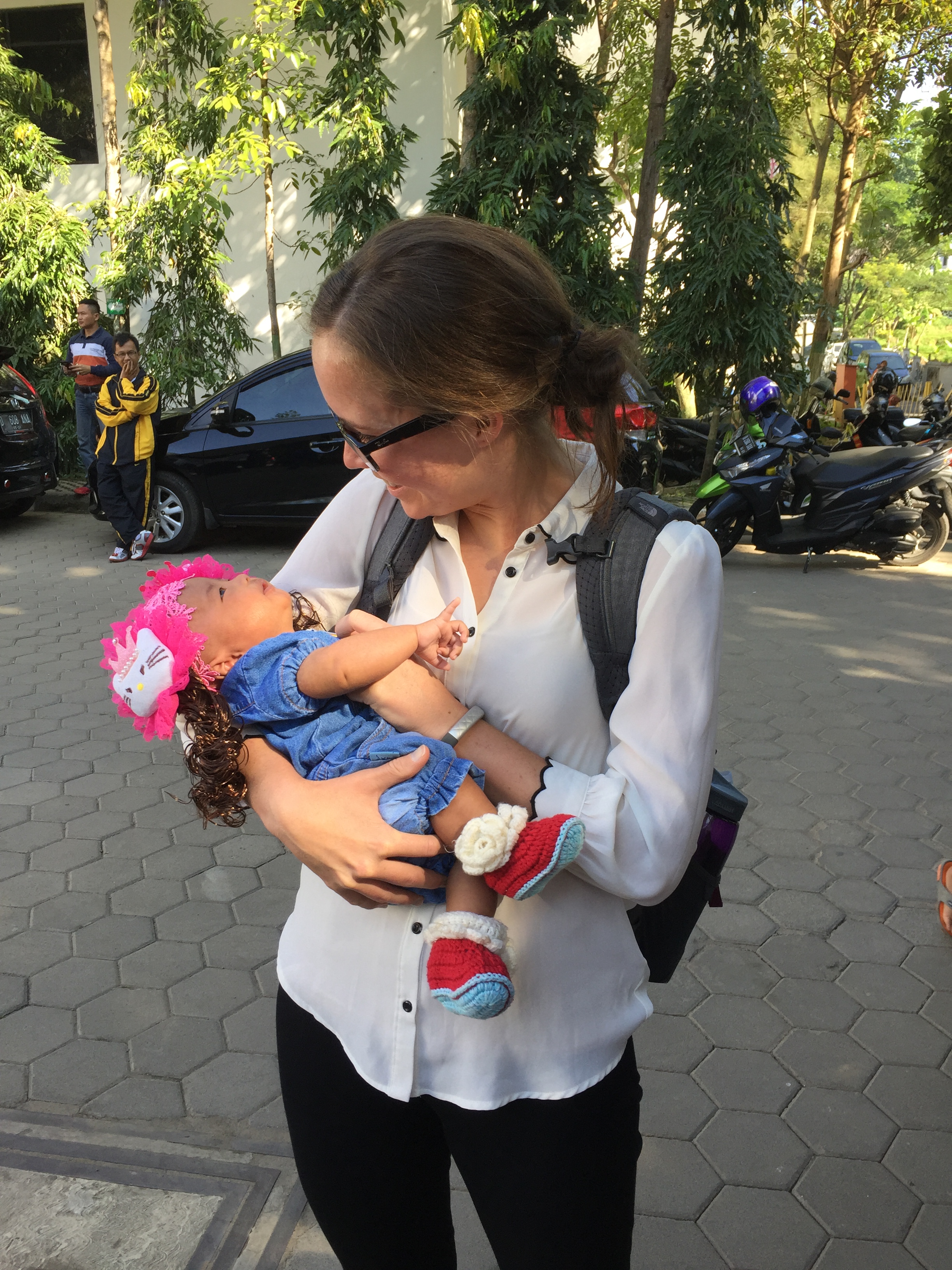 Mackenzie holding a beautiful baby