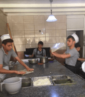 People cooking in a kitchen